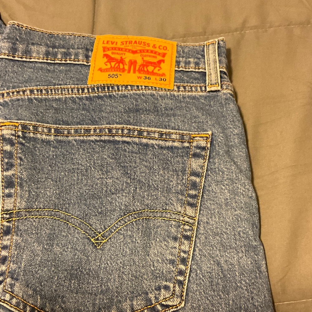 Levi's 505 Relaxed Straight Jeans - Light Blue Denim with Tan Patch